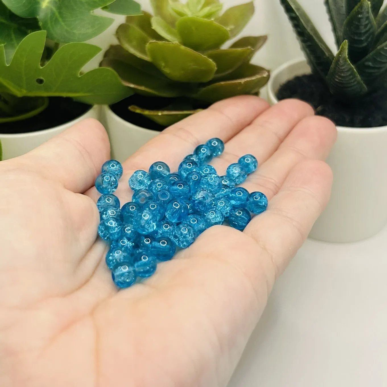 1 strand (aprx 133 beads) 6 mm Aqua Blue Glass Crackle Beads